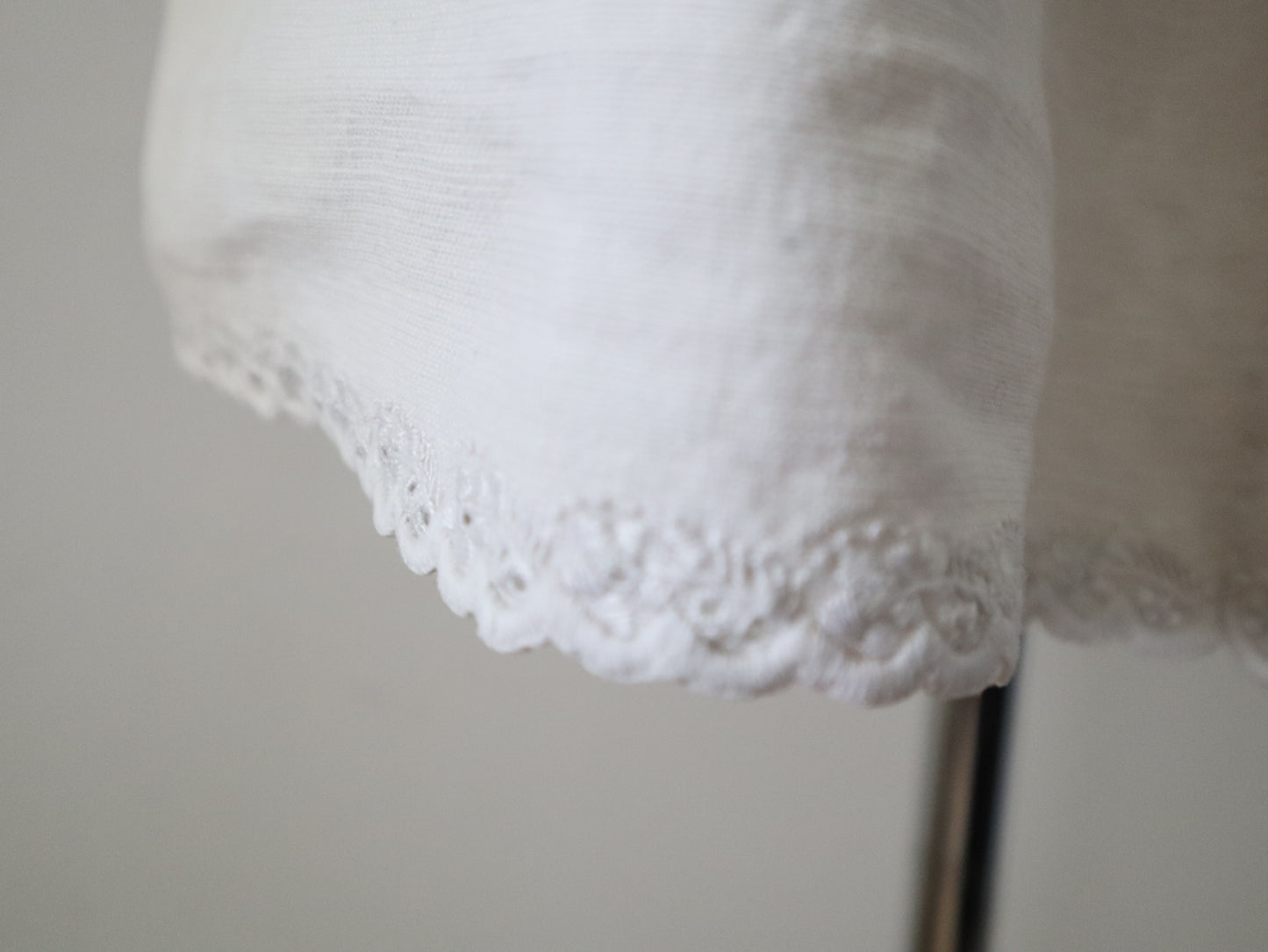 1930s Transylvanian homespun linen folk blouse blue embroidery cutwork floral details blue glass buttons menswear