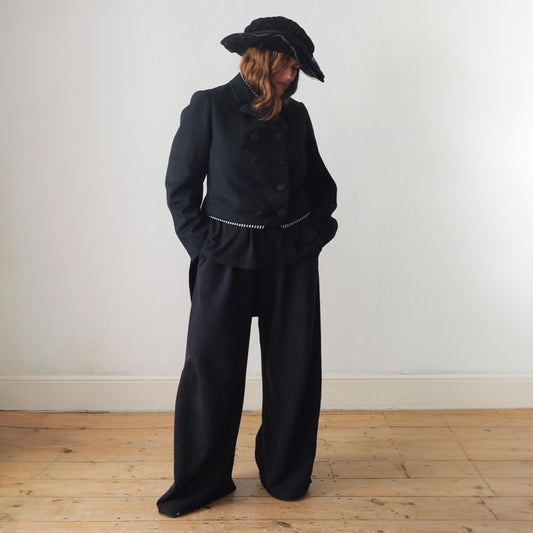 Antique Belle Jardinière Paris black wool coat with striped trim and silk buttons early 1900