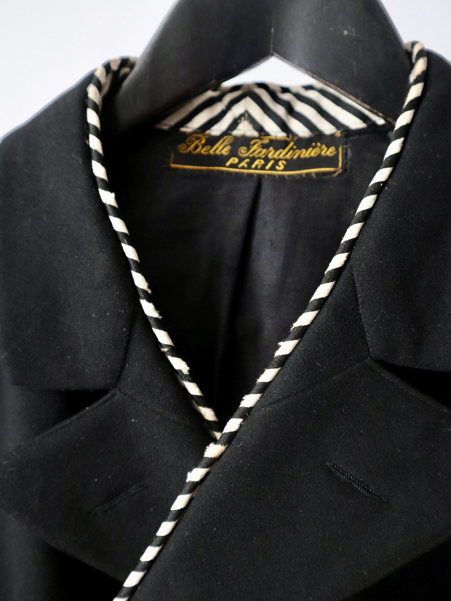 Antique Belle Jardinière Paris black wool coat with striped trim and silk buttons early 1900