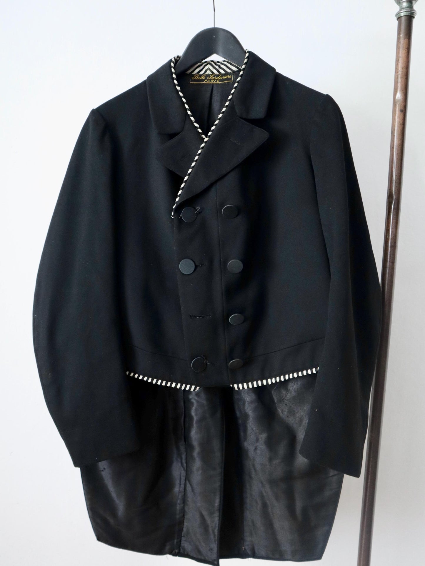 Antique Belle Jardinière Paris black wool coat with striped trim and silk buttons early 1900