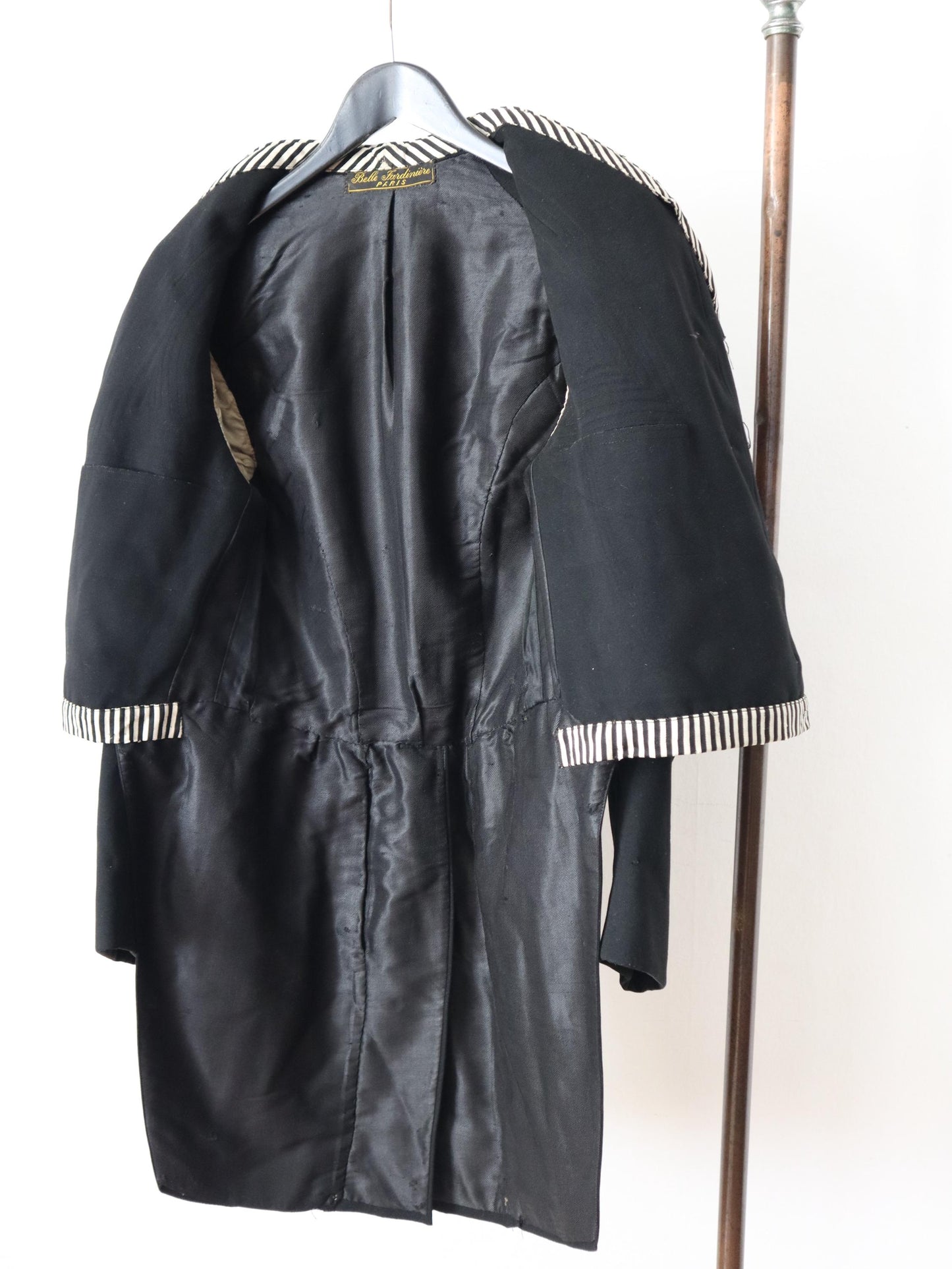 Antique Belle Jardinière Paris black wool coat with striped trim and silk buttons early 1900