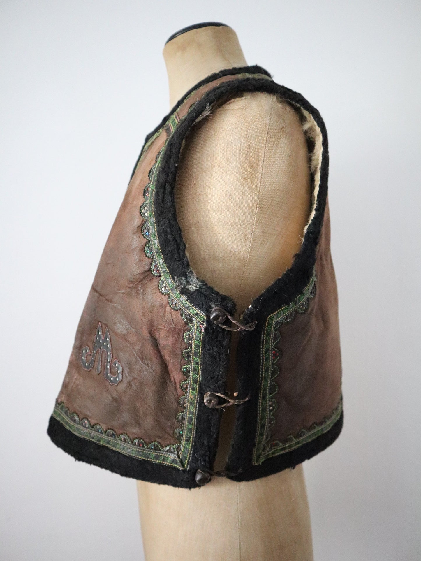 1920s Hungarian sheepskin leather vest waistcoat embroidered tooled brown green Eastern European