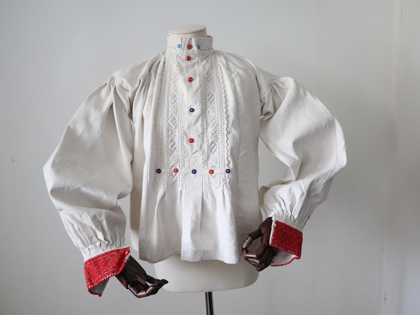 1930s Transylvanian homespun linen folk blouse cutwork embroidery red and blue pressed glass buttons menswear